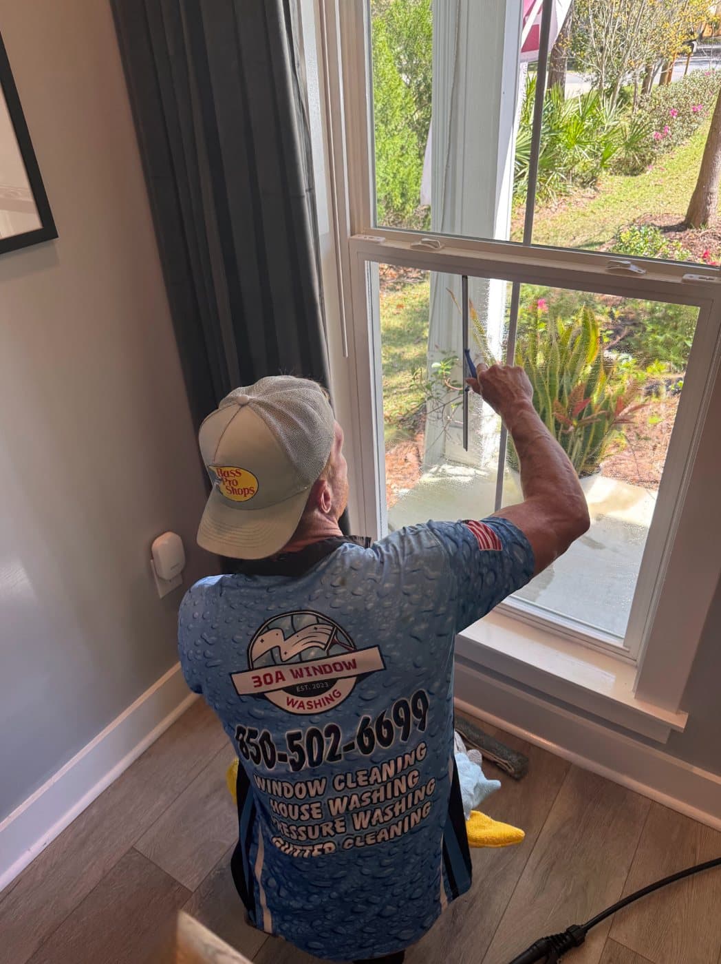 Cleaning an interior double-hung window